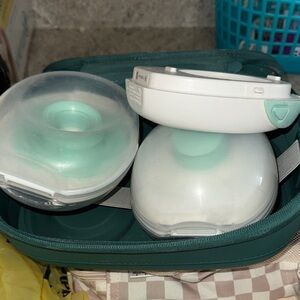 Willow Portable Electric Breast Pump with Teal Accents and Phone App Connection